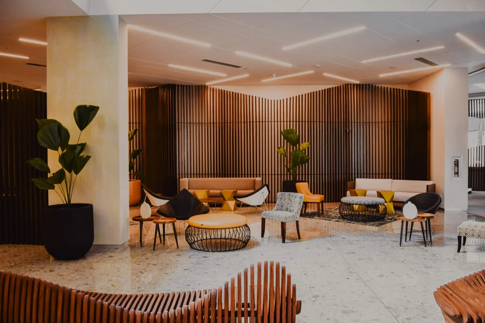 Hotel lobby with timber walls and designer furniture