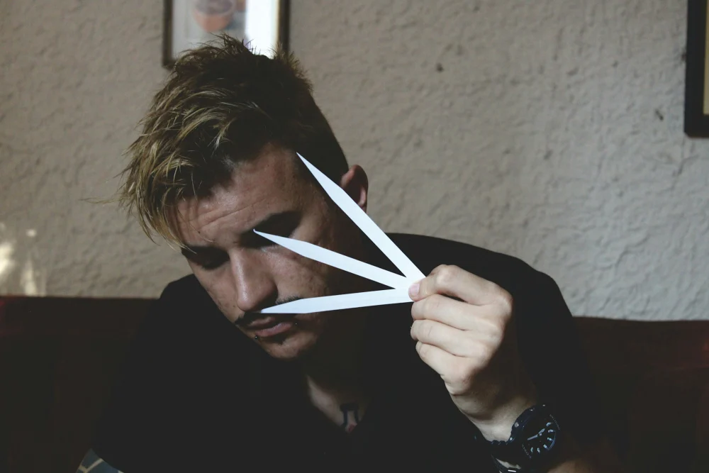 Perfumer evaluating a fragrance on smelling strips
