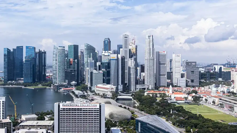 Office towers on the Marina Bay waterfront by day